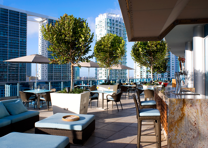 Outside view of a luxury city rooftop hotel restaurant and bar managed by hospitality operations company, hotelAVE
